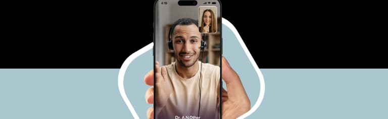A hand holding a smartphone showing the NowPatient’s app screen, with a Virtual Consultations card rated 4.7 Excellent by 500+ users.